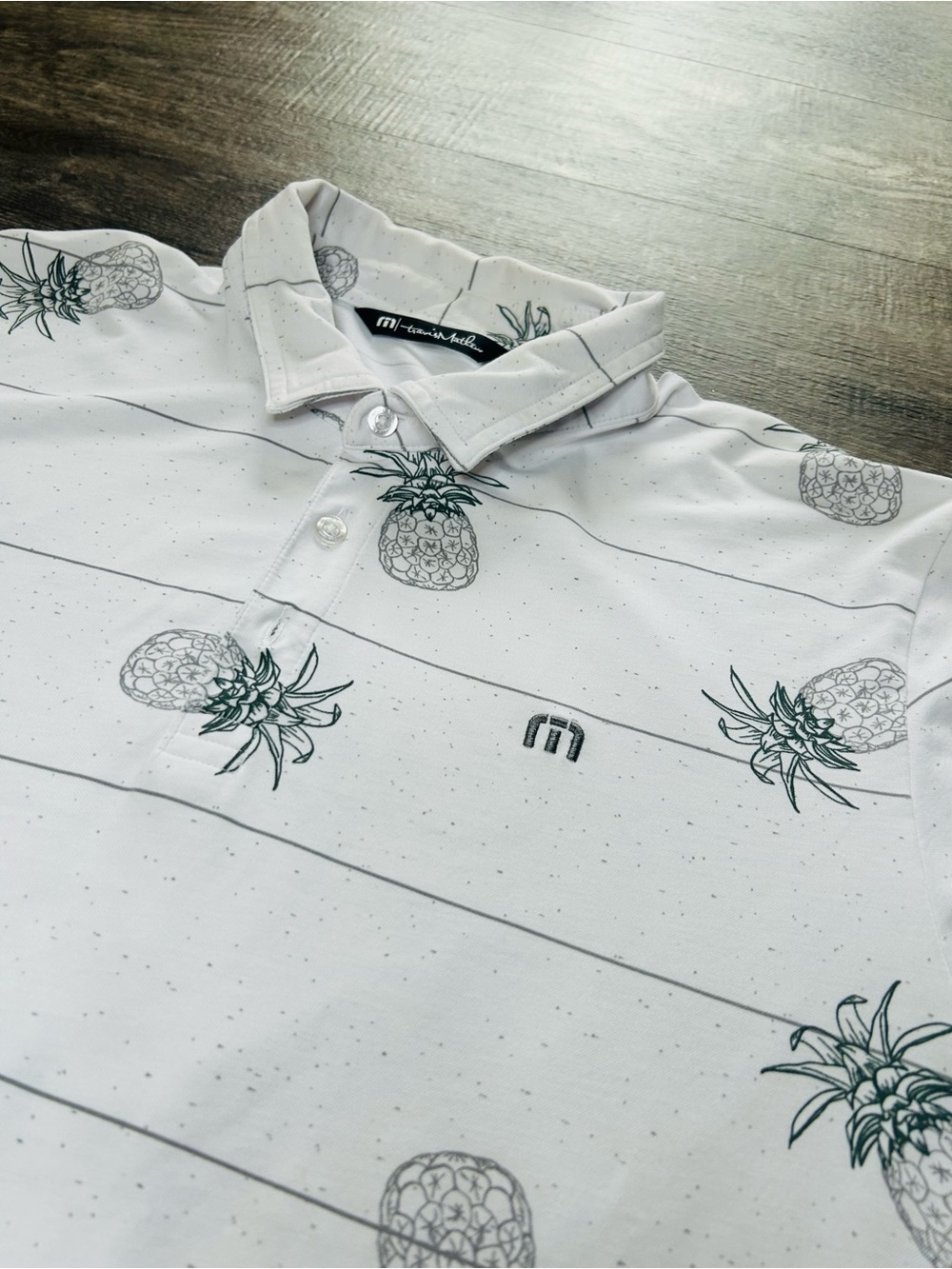 Travis Mathew White Pineapple-Print Polo with Thin Stripe Detail